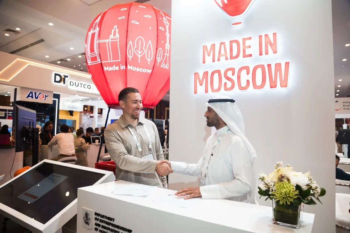 Partnership handshake at GITEX 2024 Made in Moscow pavilion